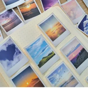 مجموعة ستيكرز بولارويد للسماء والسحاب 40 قطعة بتصميمات غروب وشفق وسحب زرقاء، مقاس 4.3×5.5 سم مع طبقة حماية للبوليت جورنال من Egy Bujo